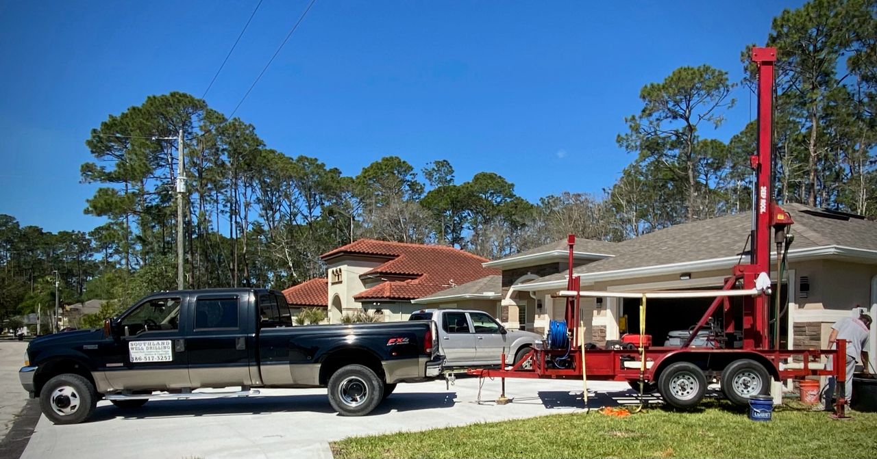 Well drilling rig on a Palm Coast, FL job site — Southland Well Drilling